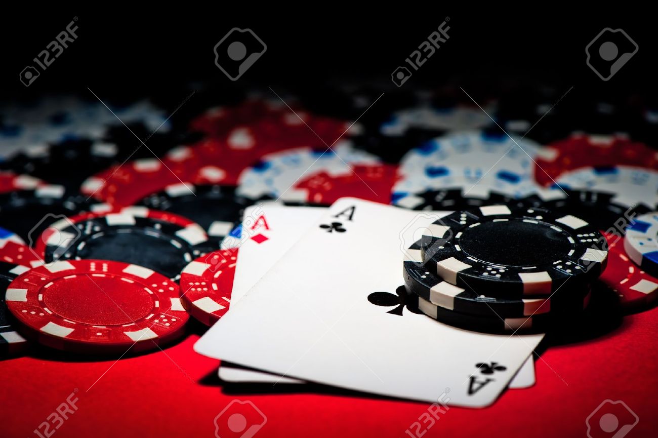 16440900-Pair-of-aces-and-poker-chips-Stock-Photo-poker-casino-cards - Team  Golf USA